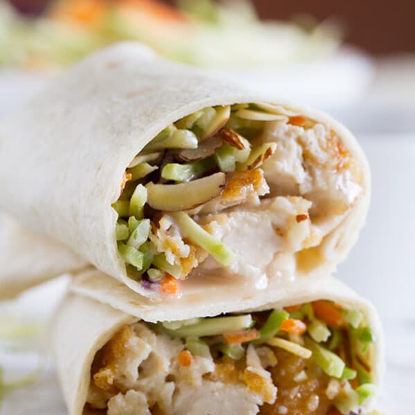 A salad in a tortilla! These Honey-Sesame Chicken Salad Wraps are a great idea for an easy weeknight dinner, and are a great way to get the kids to eat their salad!