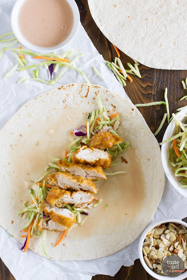 A salad in a tortilla! These Honey-Sesame Chicken Salad Wraps are a great idea for an easy weeknight dinner, and are a great way to get the kids to eat their salad!