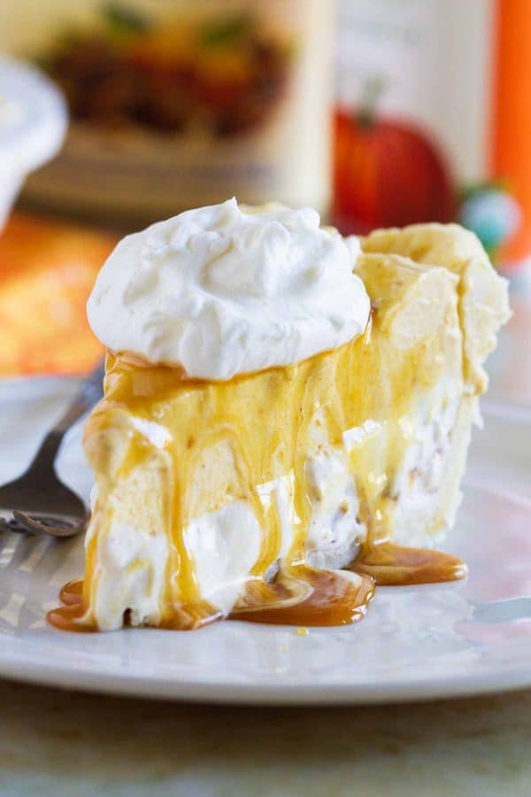 Change up your holiday pie with this non-traditional pumpkin pie recipe.  This Pumpkin and Butter Pecan Ice Cream Pie Recipe is fun and easy!