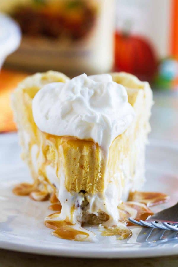 Change up your holiday pie with this non-traditional pumpkin pie recipe.  This Pumpkin and Butter Pecan Ice Cream Pie Recipe is fun and easy!