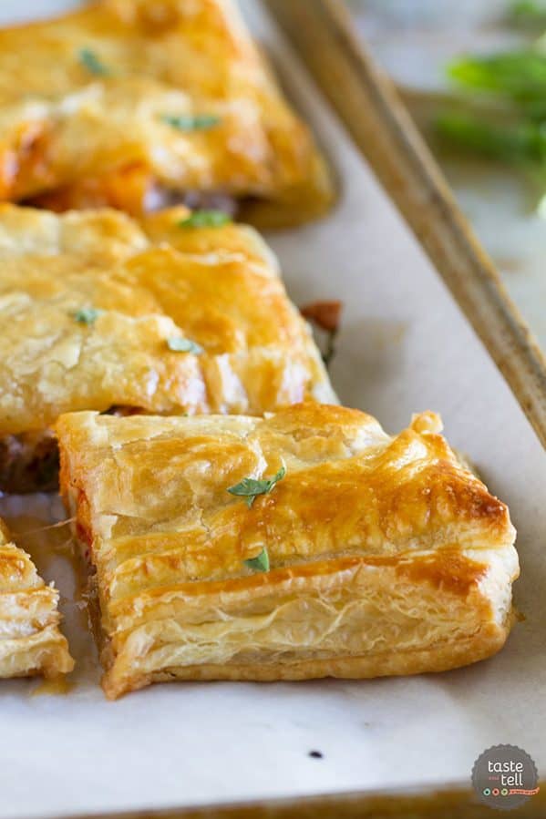 The perfect fall recipe - this Sausage and Butternut Squash Slab Pie is filled with comfort! Sausage, butternut squash and cheese are a perfect match!