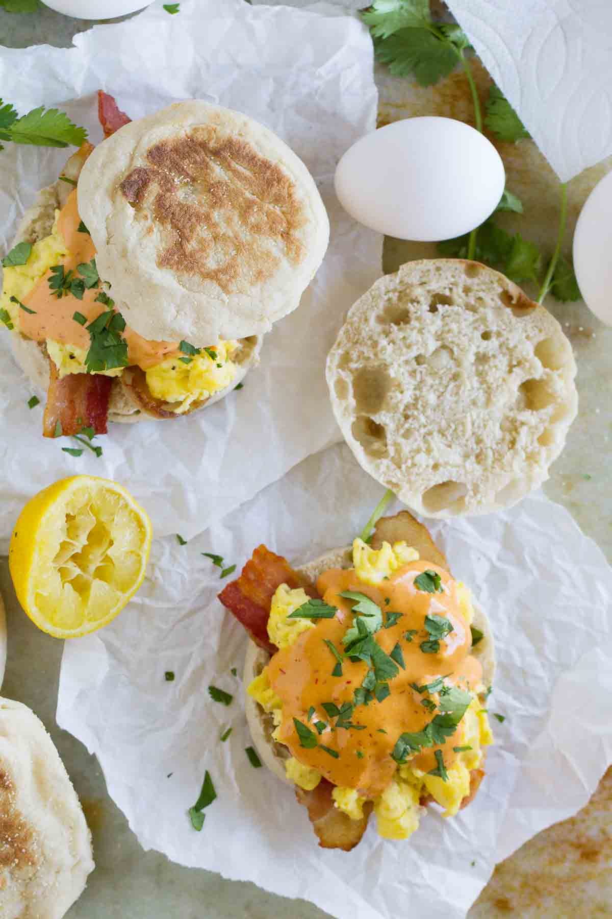 overhead view of Bacon and Eggs Benedict Sandwich with Chipotle Hollandaise