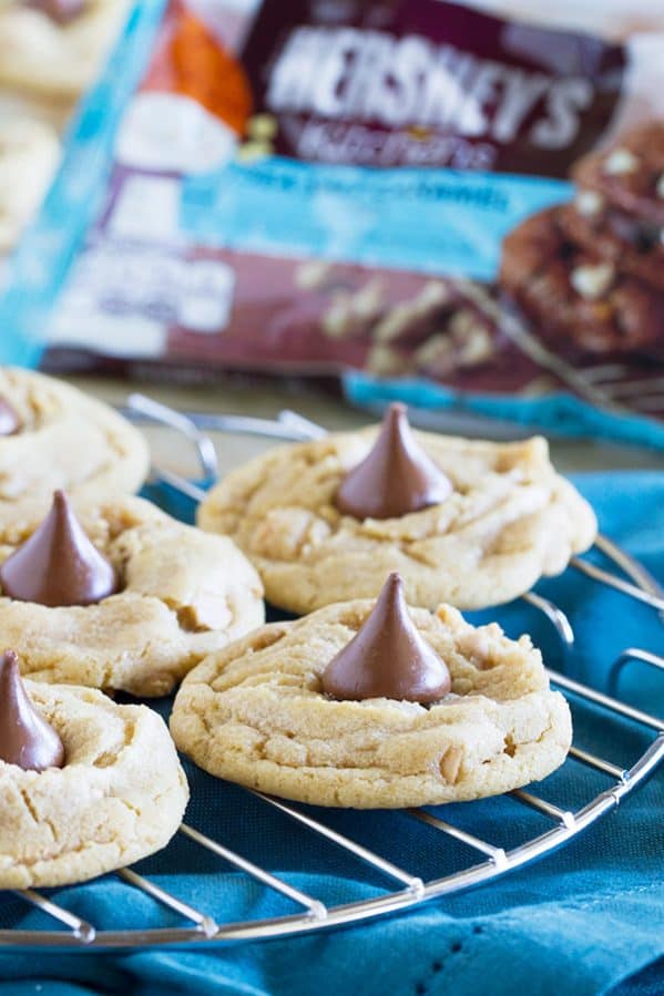 Sweet and a little salty, these Sea Salt Caramel Chip Blossom Cookies are a twist on the traditional blossom cookie that is perfect for holiday baking, or just for filling the cookie jar!