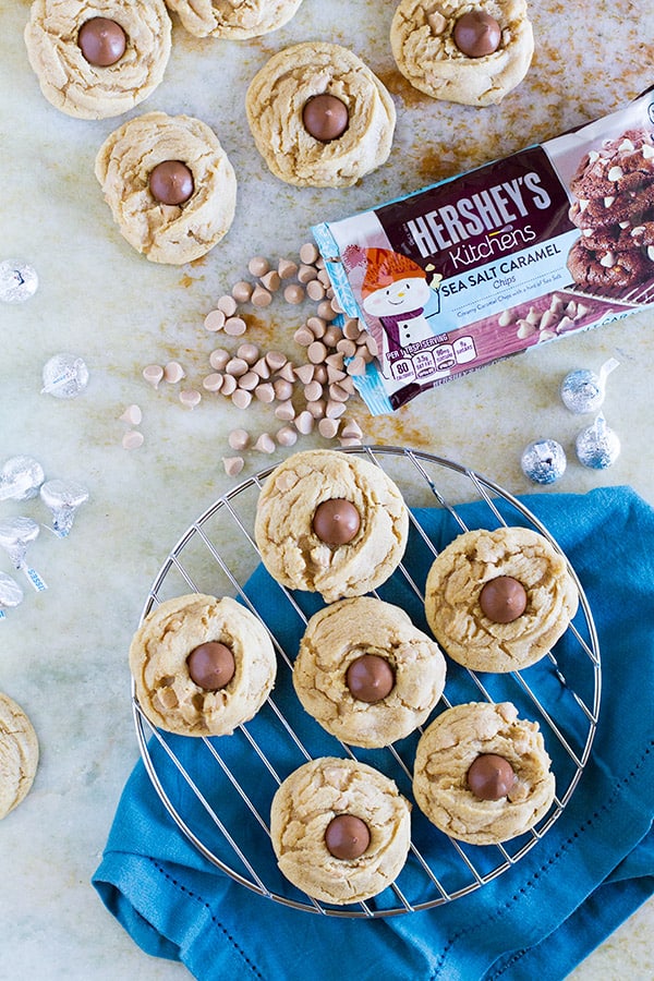 Sweet and a little salty, these Sea Salt Caramel Chip Blossom Cookies are a twist on the traditional blossom cookie that is perfect for holiday baking, or just for filling the cookie jar!