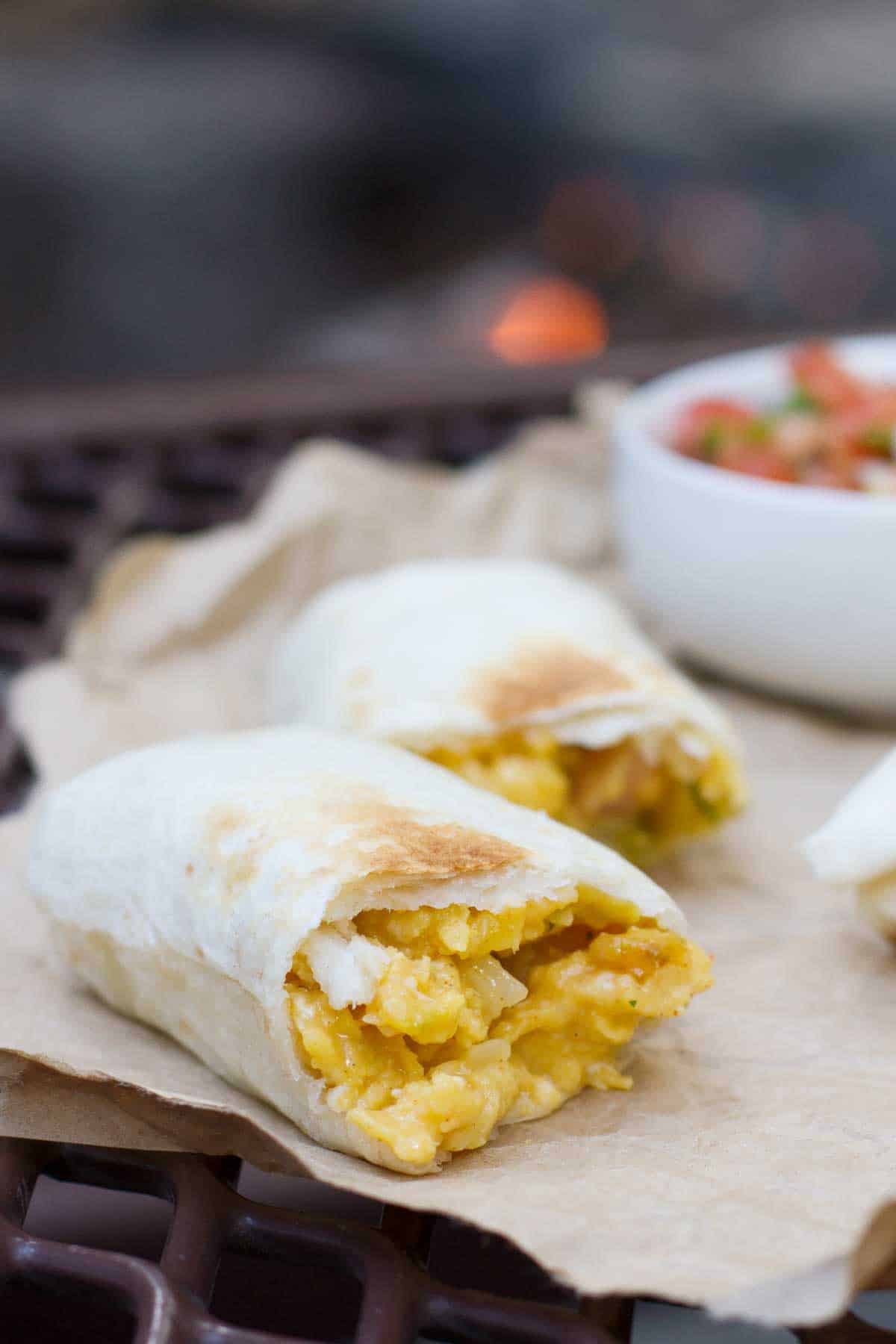 https://www.tasteandtellblog.com/wp-content/uploads/2016/12/Breakfast-Burritos-Campfire-Style-Taste-and-Tell-1-lr.jpg