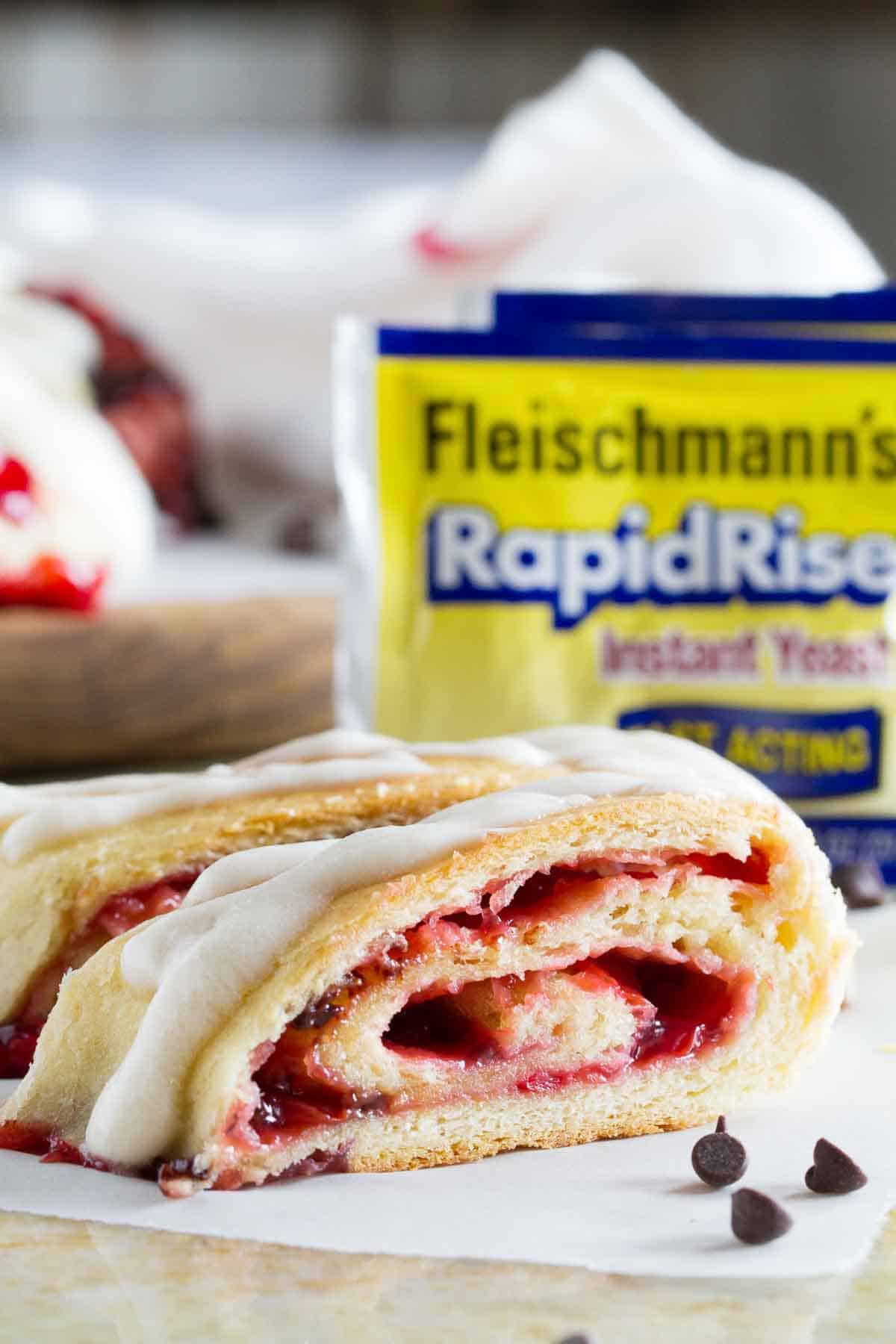 Chocolate Cherry Roll topped with a simple glaze.