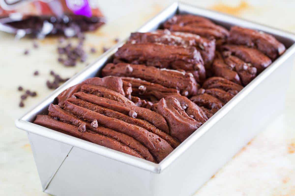 Chocolate pull apart bread in a loaf pan.
