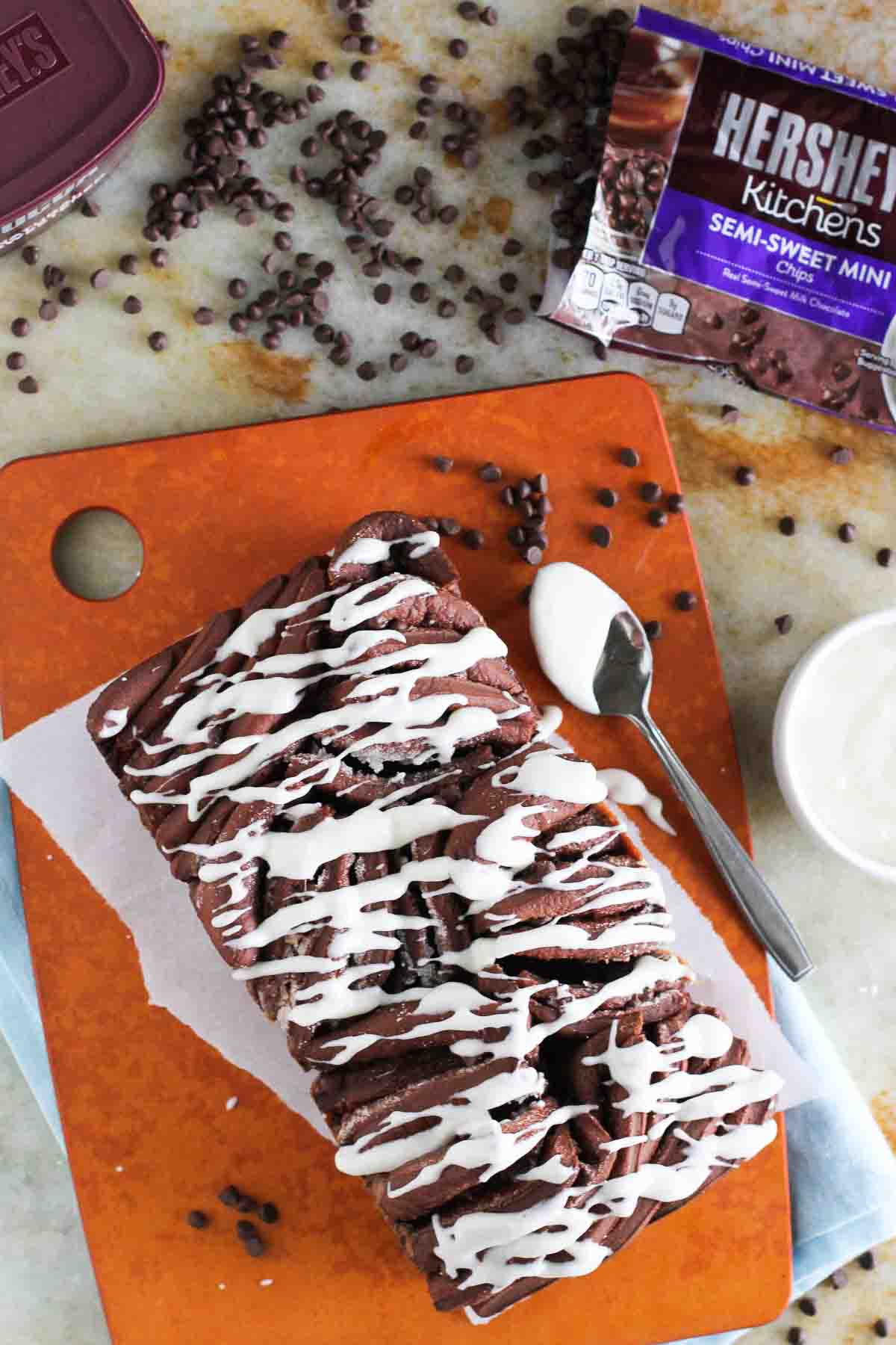 Chocolate Pull Apart Bread with mini chocolate chips on a cutting board.