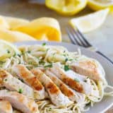 Lemon Chicken Pasta on a plate topped with parsley