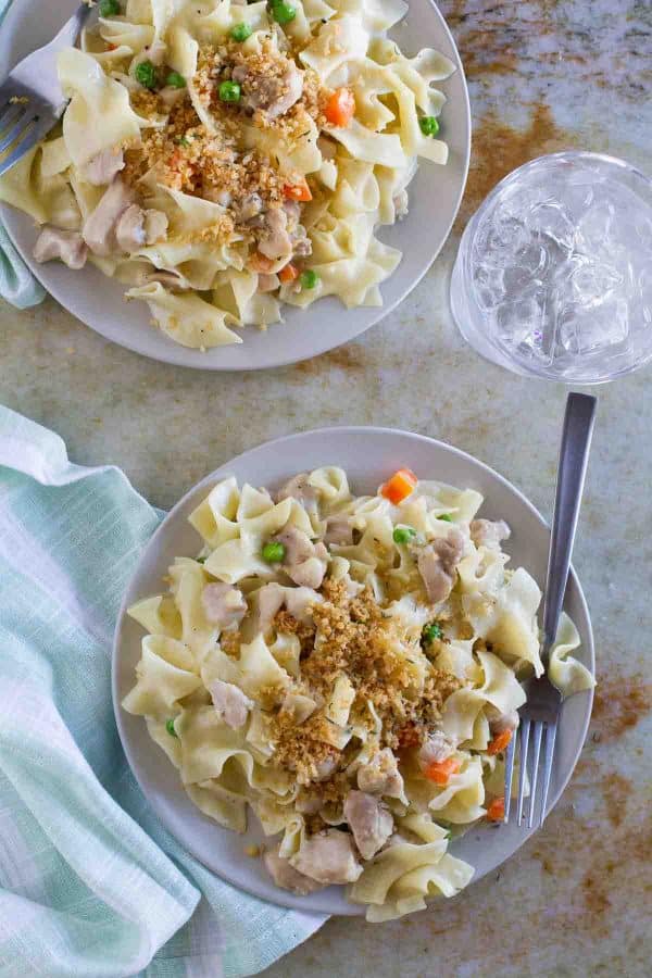 The flavors of chicken pot pie - in pasta form! This Chicken Pot Pie Ragu combines a creamy chicken gravy with pasta for a comforting, warming dinner.