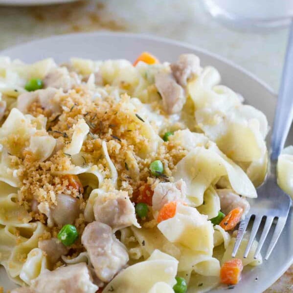 The flavors of chicken pot pie - in pasta form! This Chicken Pot Pie Ragu combines a creamy chicken gravy with pasta for a comforting, warming dinner.
