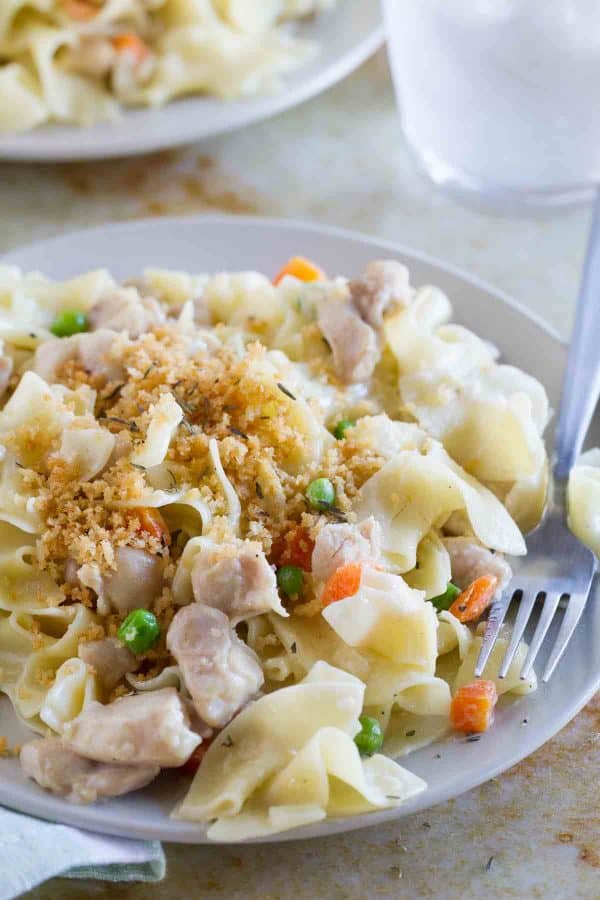 The flavors of chicken pot pie - in pasta form! This Chicken Pot Pie Ragu combines a creamy chicken gravy with pasta for a comforting, warming dinner.