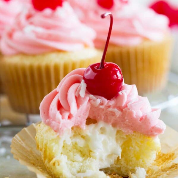 filled cupcake with cherry buttercream