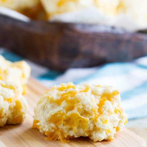 Garlic and Cheddar Sour Cream Biscuits on a cutting board