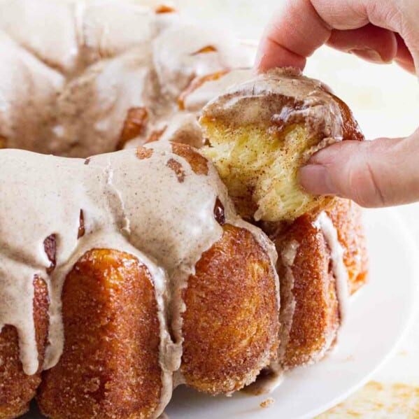 pulling a piece of dough from monkey bread