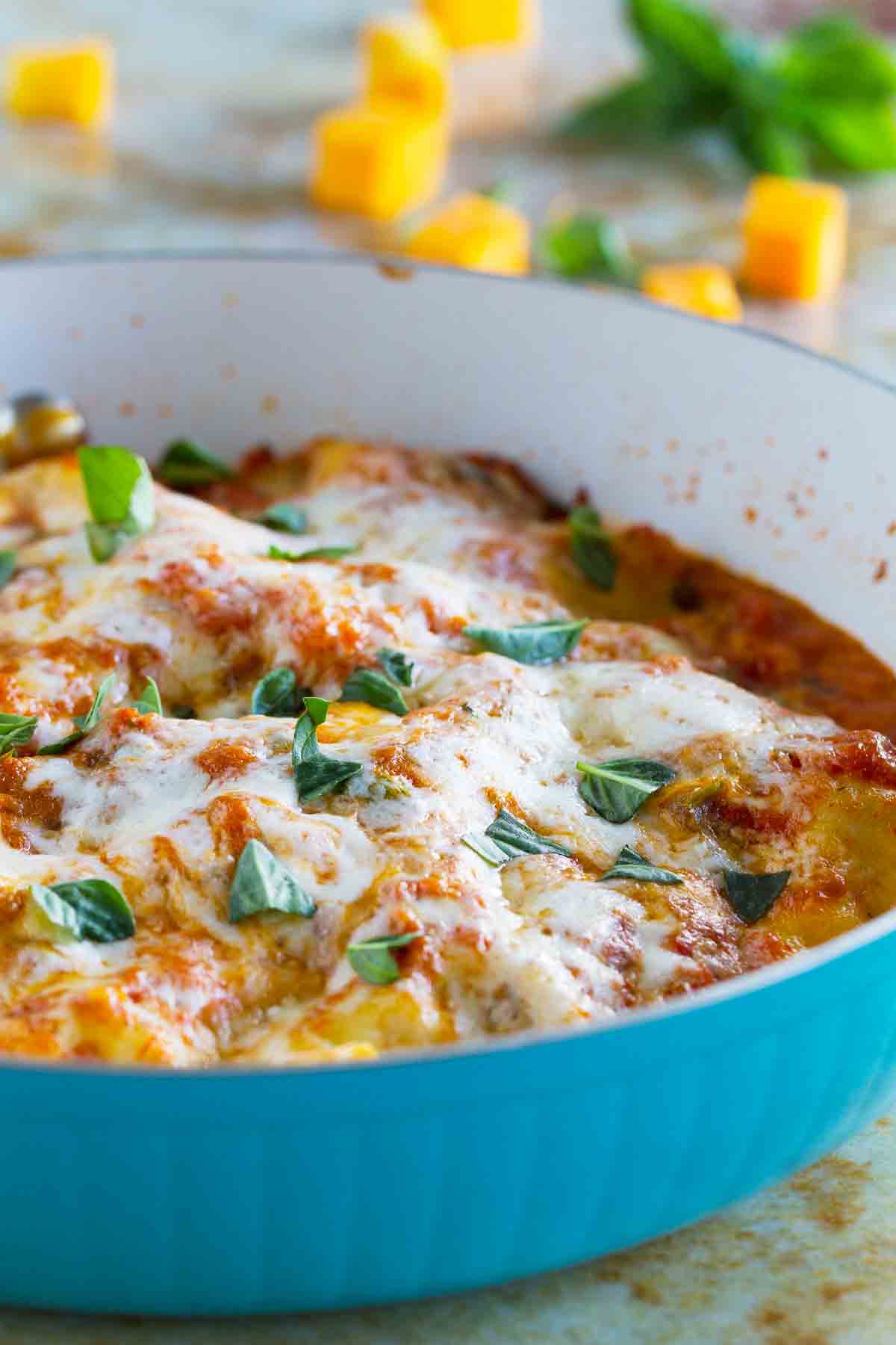 blue skillet with butternut squash lasagna