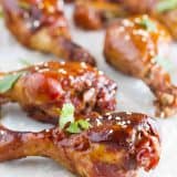 Slow Cooker Sweet Chili Chicken Drumsticks sprinkled with sesame seeds