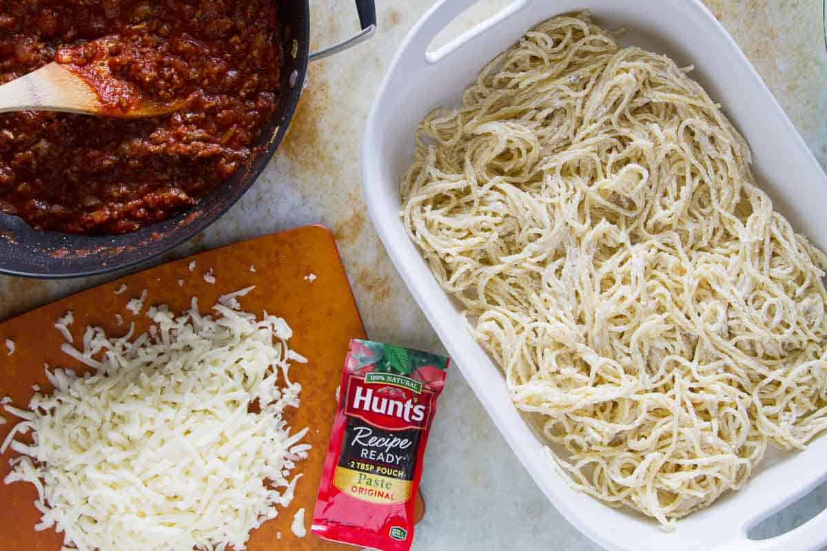 Spaghetti lasagna being prepared.