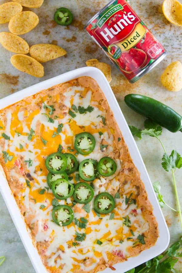 Get ready for game day with this Spicy Sausage Dip with Tomatoes - full of spice and flavor, it’s a crowd pleaser every time you serve it.