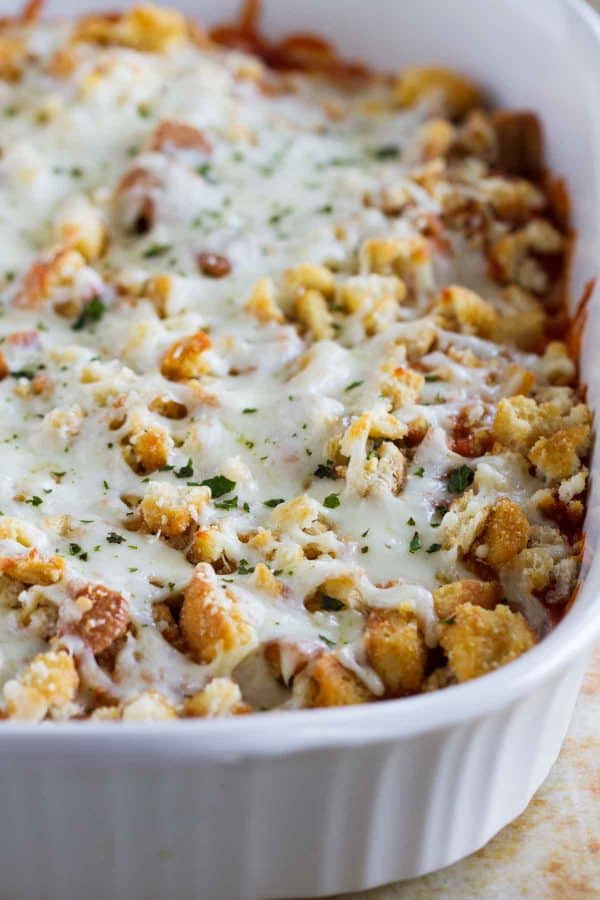 Forget the time and effort of breading and frying chicken - this Cheater Chicken Parmesan Bake gives you the same flavors and crispy texture from chicken parmesan with half the effort!