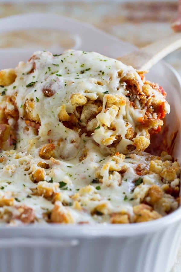 Forget the time and effort of breading and frying chicken - this Cheater Chicken Parmesan Bake gives you the same flavors and crispy texture from chicken parmesan with half the effort!
