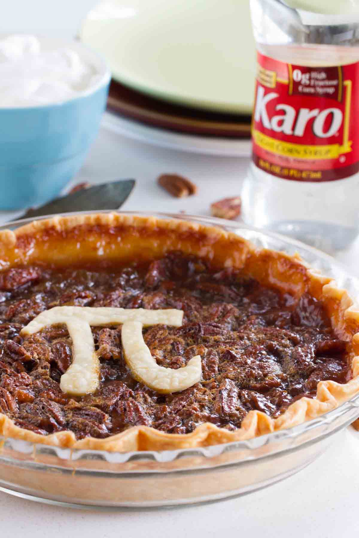 Whole Classic Pecan Pie with a Pi sign in pie dough.