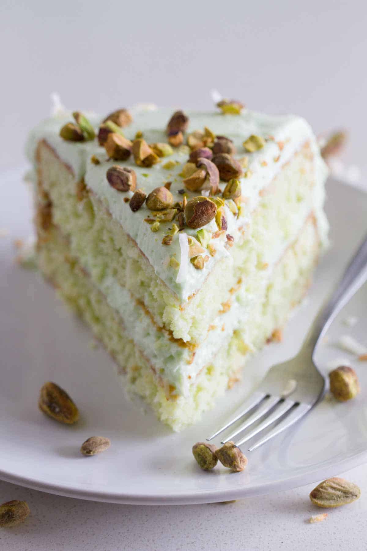 Layered Coconut and Pistachio Pudding Cake