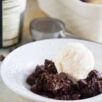 Anyone can make this ridiculously easy Gooey Caramel Chocolate Dump Cake. No box mixes, only a short amount of time to throw it together, and this humble cake can be satisfying any chocolate craving.