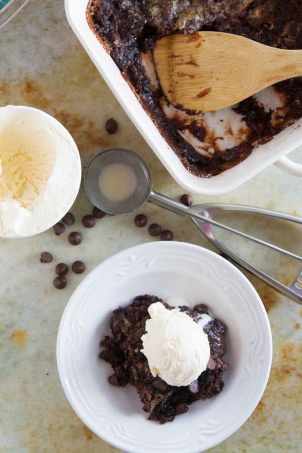 Anyone can make this ridiculously easy Gooey Caramel Chocolate Dump Cake. No box mixes, only a short amount of time to throw it together, and this humble cake can be satisfying any chocolate craving.