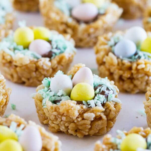 Easter Basket Scotcheroos with chocolate, coconut, and chocolate eggs.