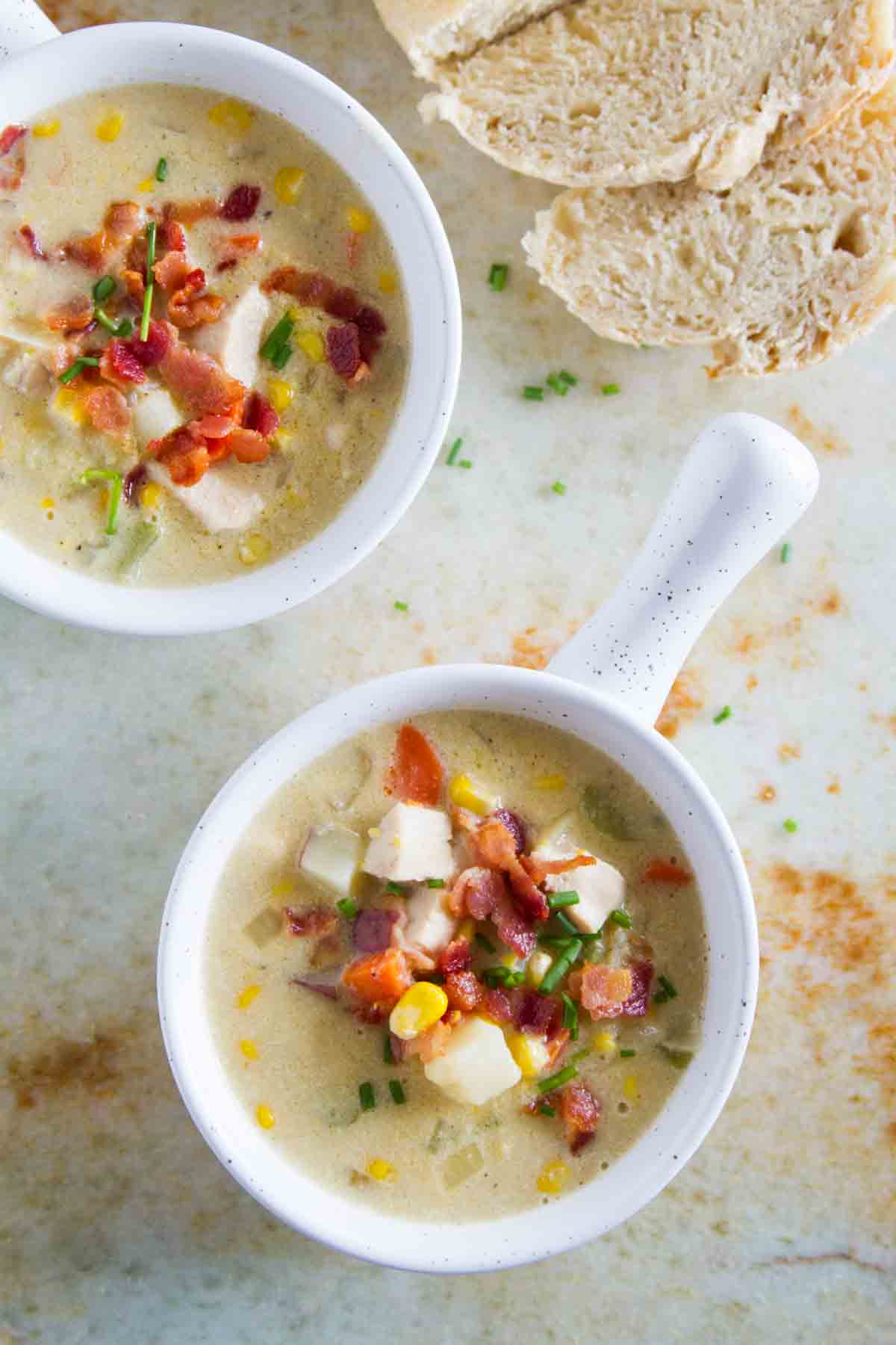 New England Chicken Corn Chowder topped with bacon and chives.