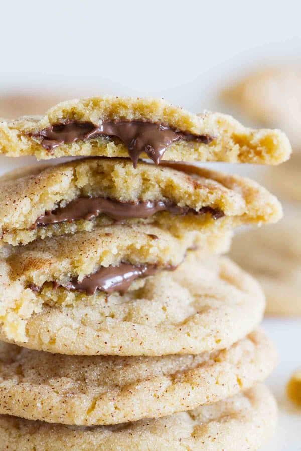 Peanut butter cookies get an upgrade with a chocolate center and a cinnamon sugar coating in these Peanut Butter Cinnamon Meltaway Cookies.