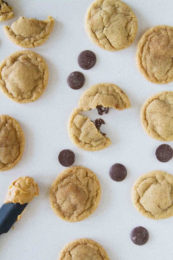 Peanut butter cookies get an upgrade with a chocolate center and a cinnamon sugar coating in these Peanut Butter Cinnamon Meltaway Cookies.