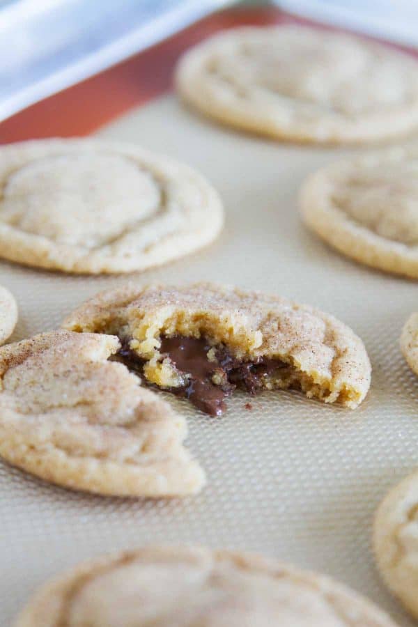 Peanut butter cookies get an upgrade with a chocolate center and a cinnamon sugar coating in these Peanut Butter Cinnamon Meltaway Cookies.