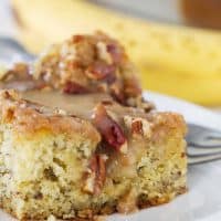 slice of banana coffee cake with honey glaze and pecans