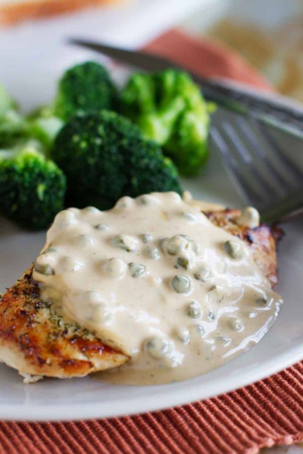 This Chicken in Caper Cream Sauce is an easy but elegant dinner recipe. Boneless chicken breasts are cooked in a skillet and served with a creamy caper cream sauce.