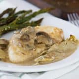 Chicken, mushrooms and artichokes are cooked in a creamy sauce, making this Creamy Artichoke Chicken a dreamy chicken dinner!