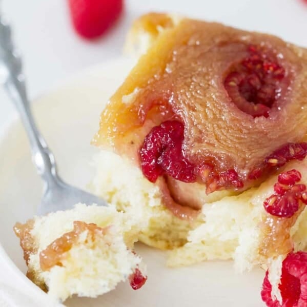 Filled with sweet raspberries and topped with gooey caramel, these Raspberry Caramel Sticky Buns are soft, sweet, sticky and delicious.