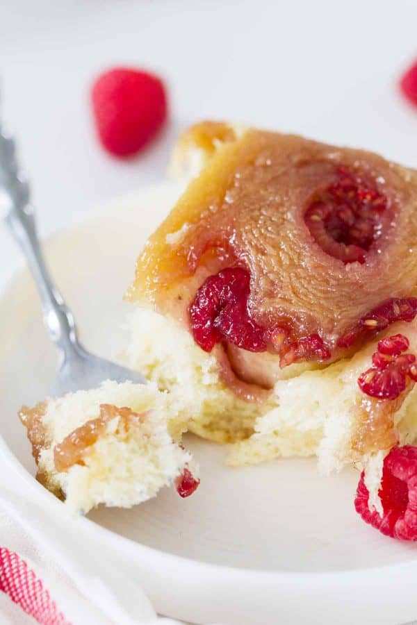 Filled with sweet raspberries and topped with gooey caramel, these Raspberry Caramel Sticky Buns are soft, sweet, sticky and delicious.