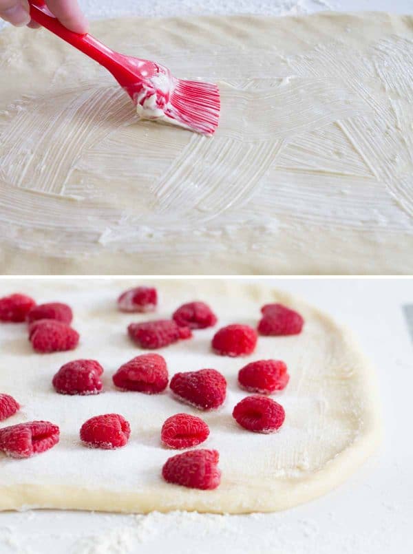 Filled with sweet raspberries and topped with gooey caramel, these Raspberry Caramel Sticky Buns are soft, sweet, sticky and delicious.