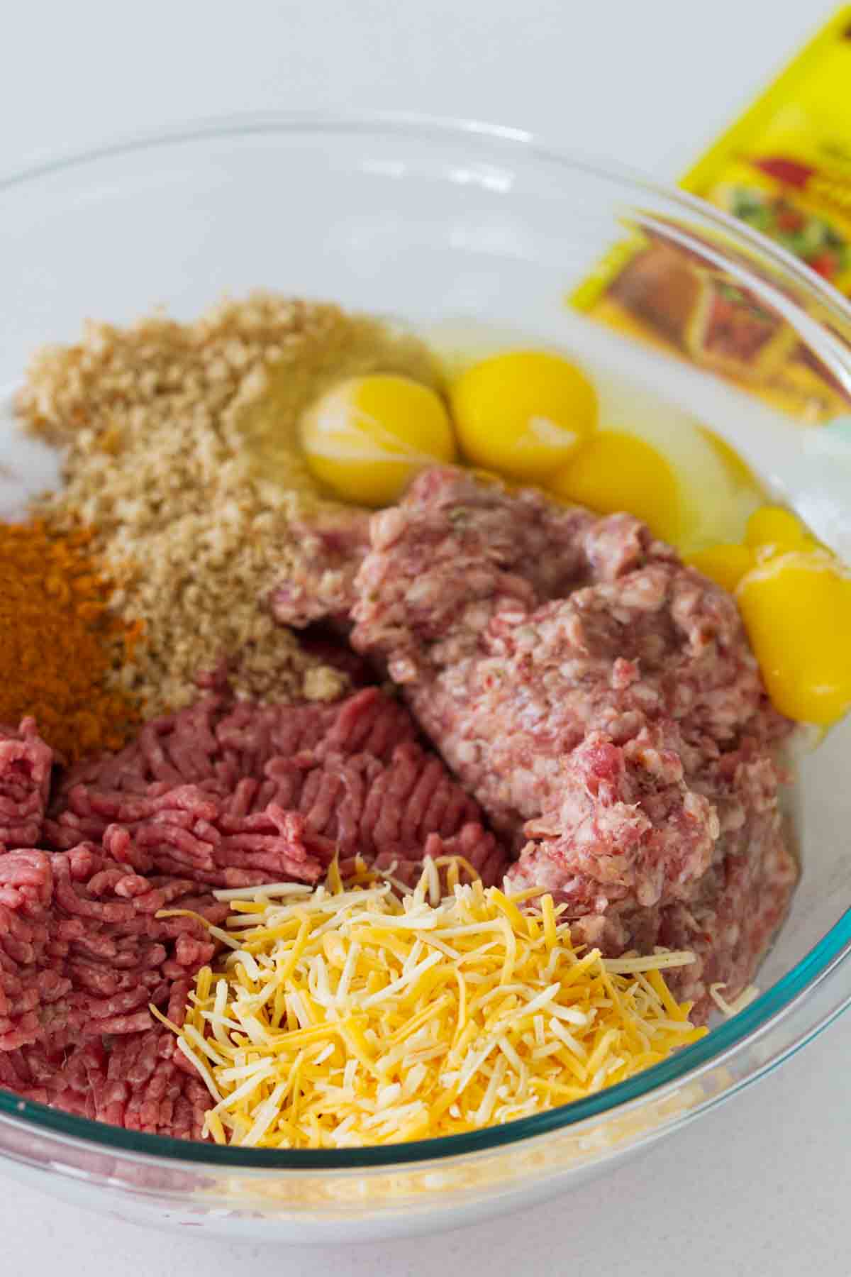Meatball mixture for Mexican meatballs in a bowl.