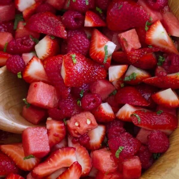 Crown Ruby Fruit Salad with raspberries, strawberries, watermelon, and lime dressing.