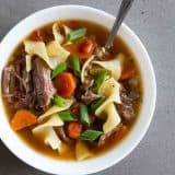 Super tender and slow cooked, this Slow Cooker Beef Noodle Soup is the definition of comfort food! Put it in the slow cooker in the morning, and a flavorful noodle soup is ready for dinner!