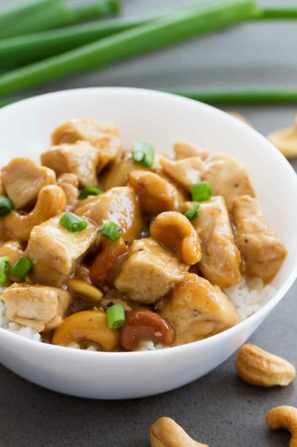 Cashew Chicken made in the Instant Pot in a bowl topped with green onion