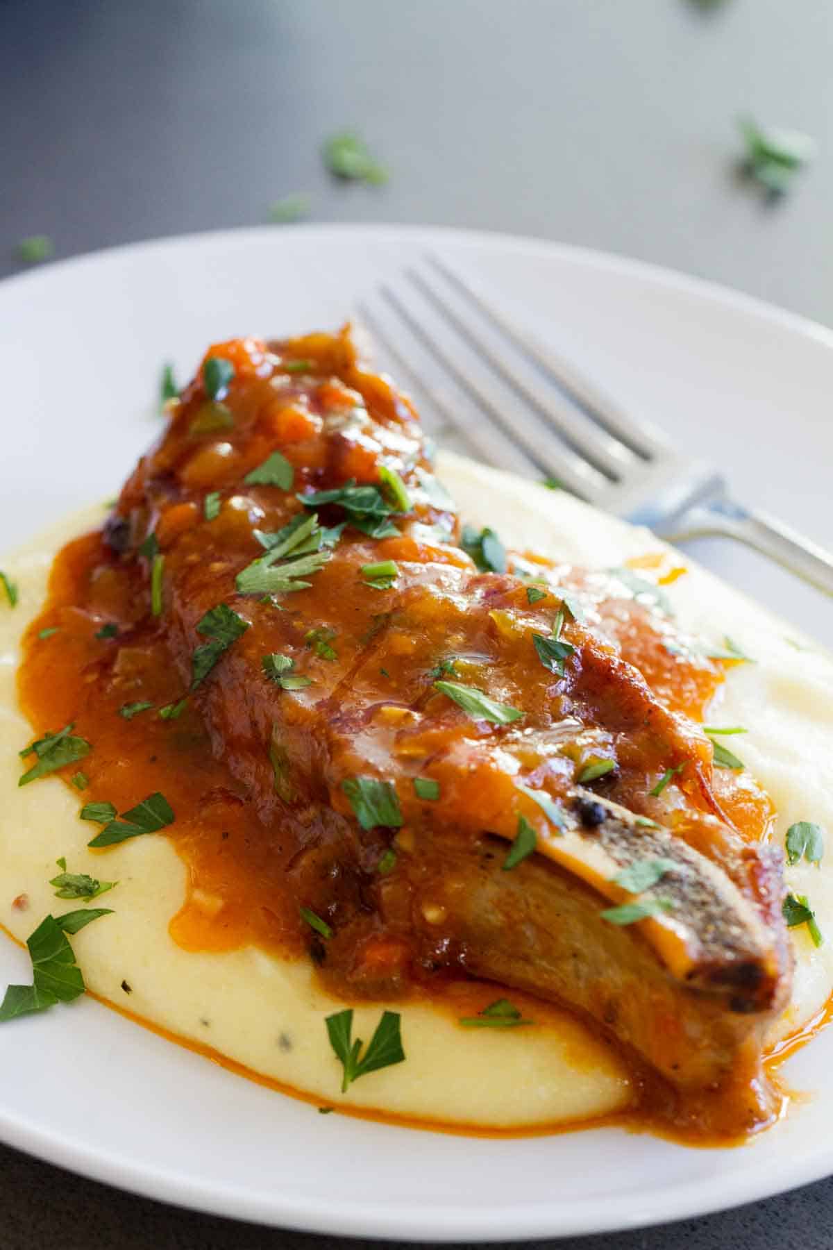 Country Style Pork Ribs served over creamy polenta.