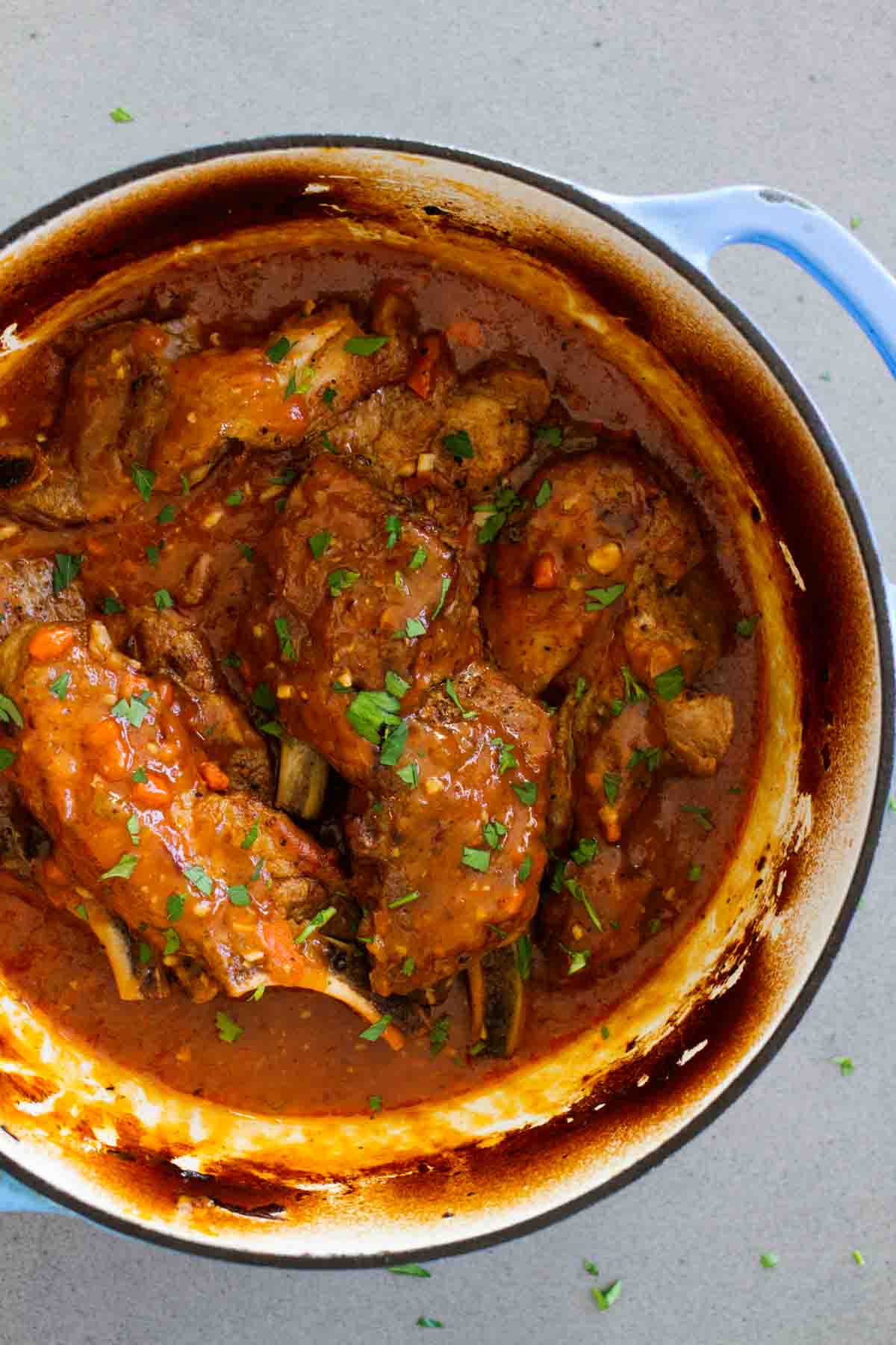 Country Style Ribs that have been braised in a Dutch oven.