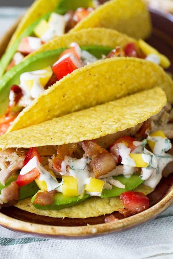 Taco Tuesday gets a makeover with these Chicken Club Tacos that have all the flavors of a chicken club sandwich in a taco shell.
