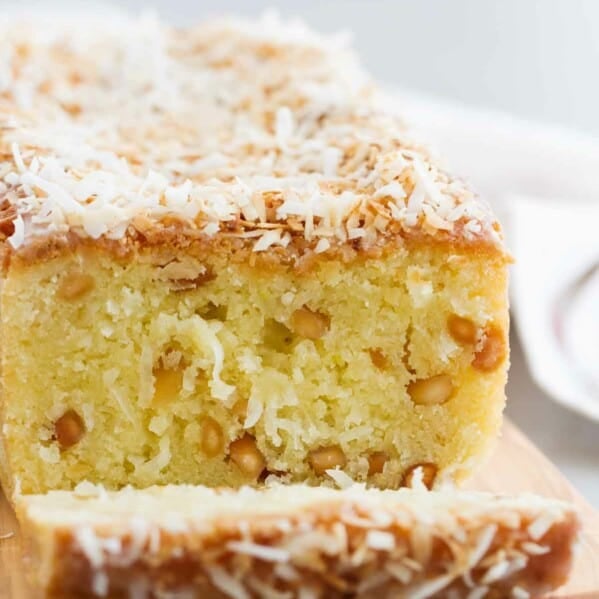 Kona Coconut Loaf on a cutting board showing inside texture