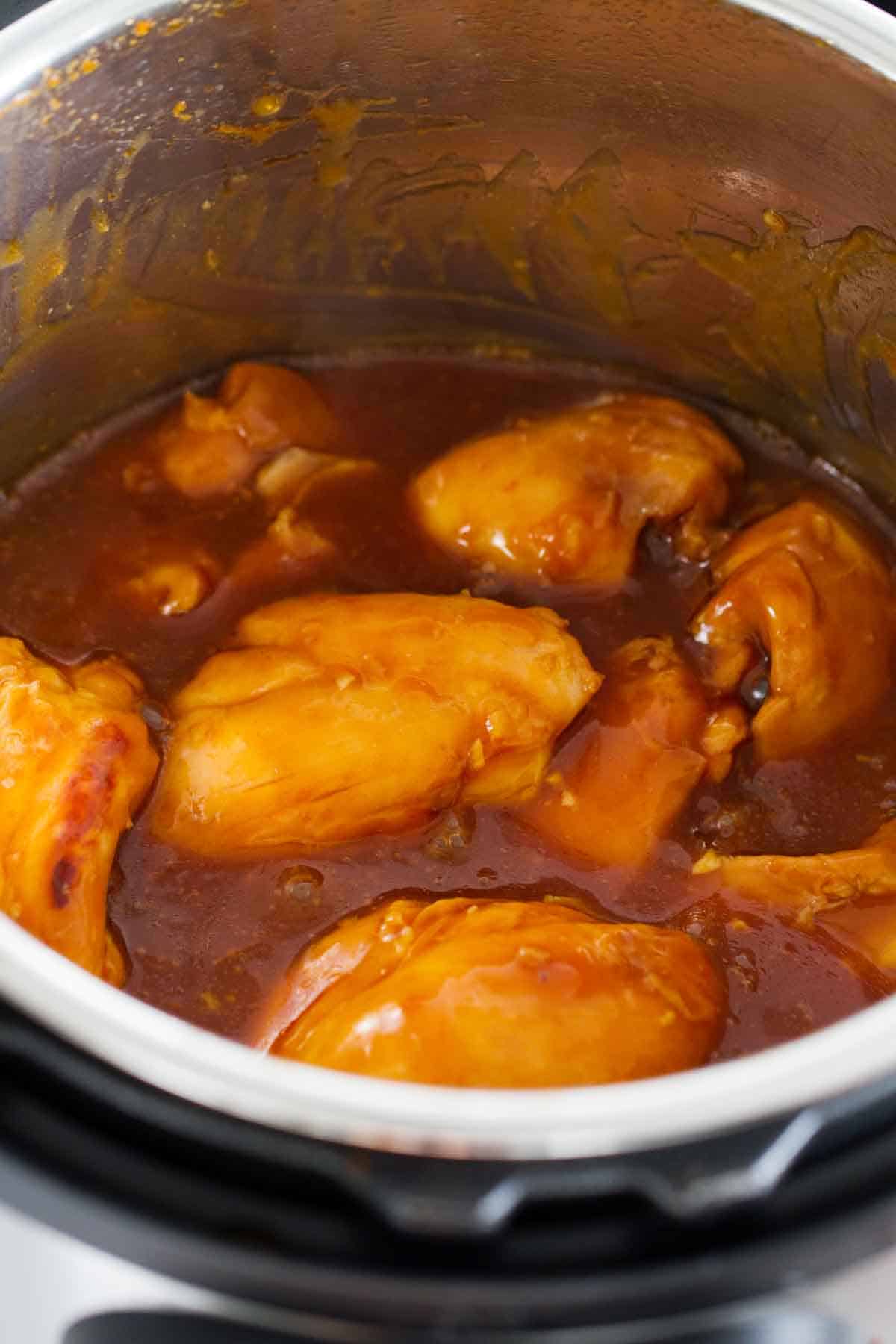 chicken thighs in an instant pot with honey garlic sauce.