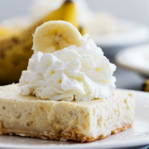 Banana Cheesecake Cookie Bar topped with whipped cream.